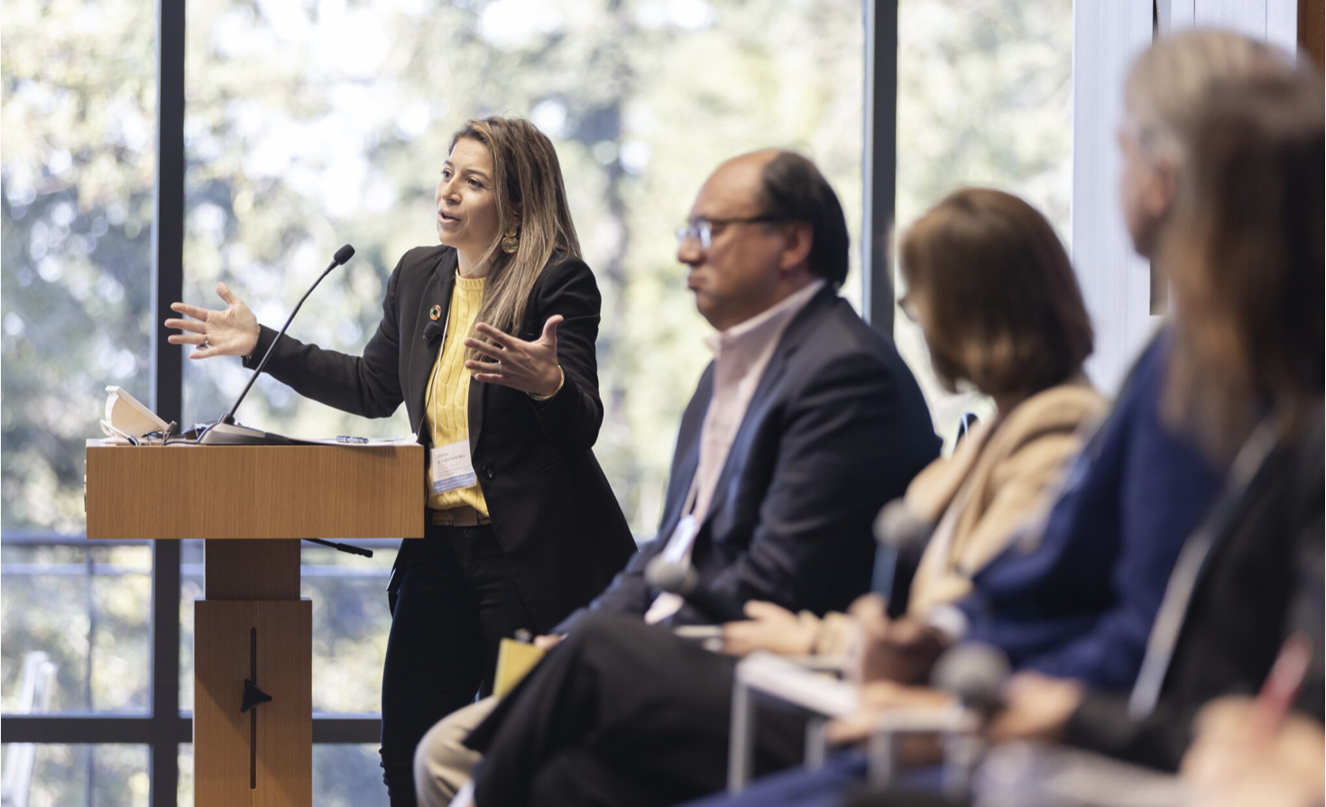 Viviana Alvarez Sanchez, former head of sustainability for Unilever North America, moderates the opening panel at the CFRM conference.